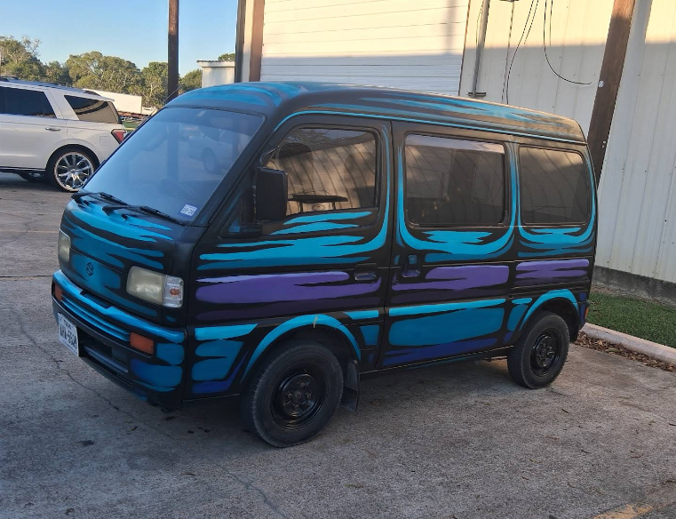 Custom painted van at the shop